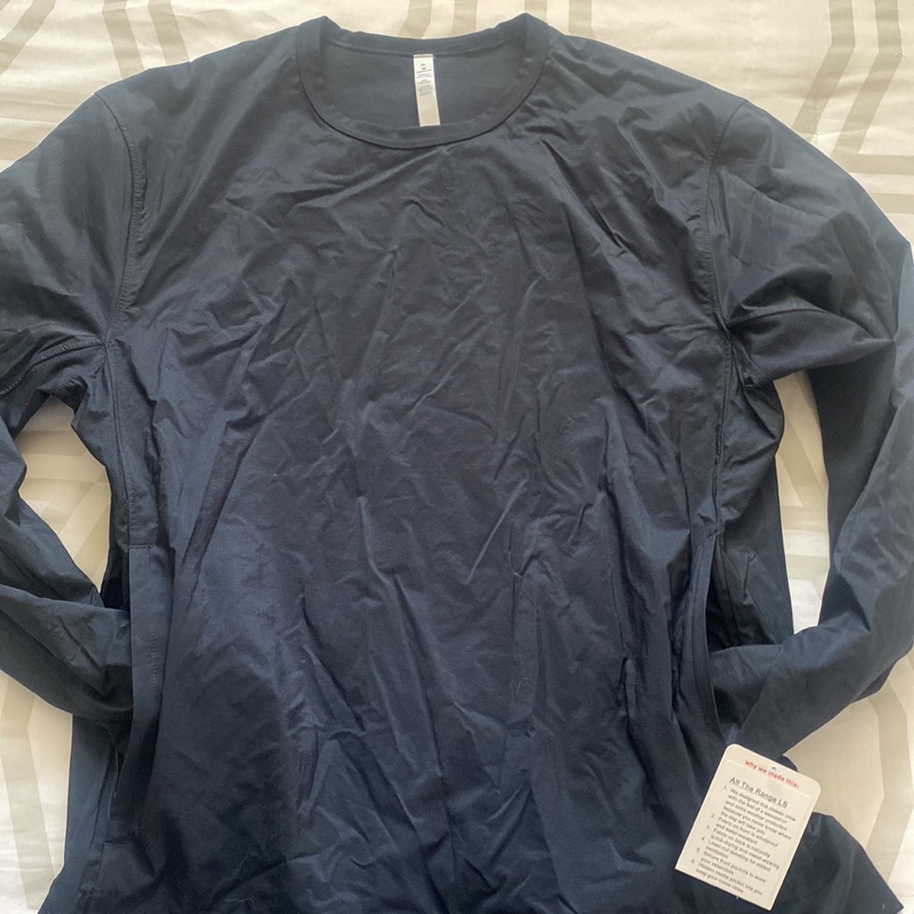 Lululemon Men’s pullover with zip pockets NWT